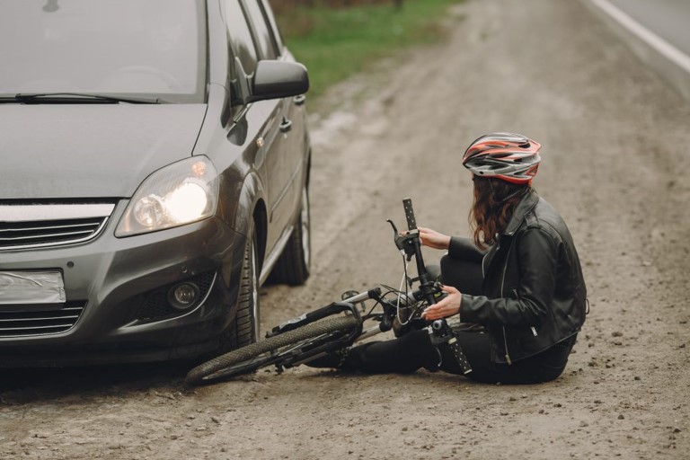Hit by an Uninsured Motorist While Riding Your Bike? Here's What You Should Do