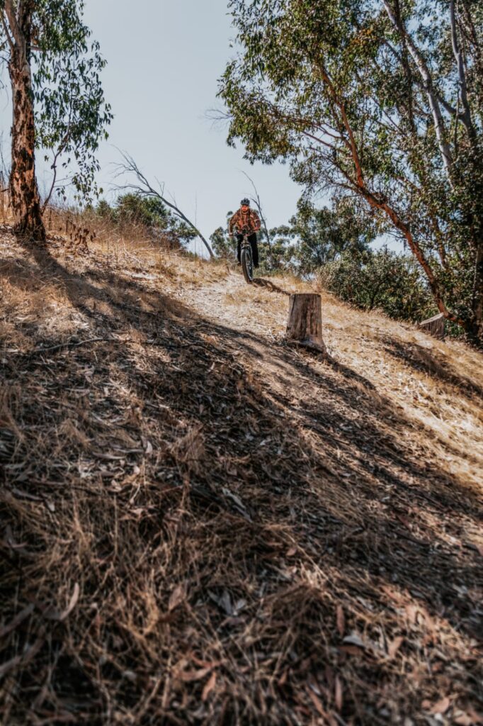 Off-road electric bike with solid-state battery technology on a rugged trail
